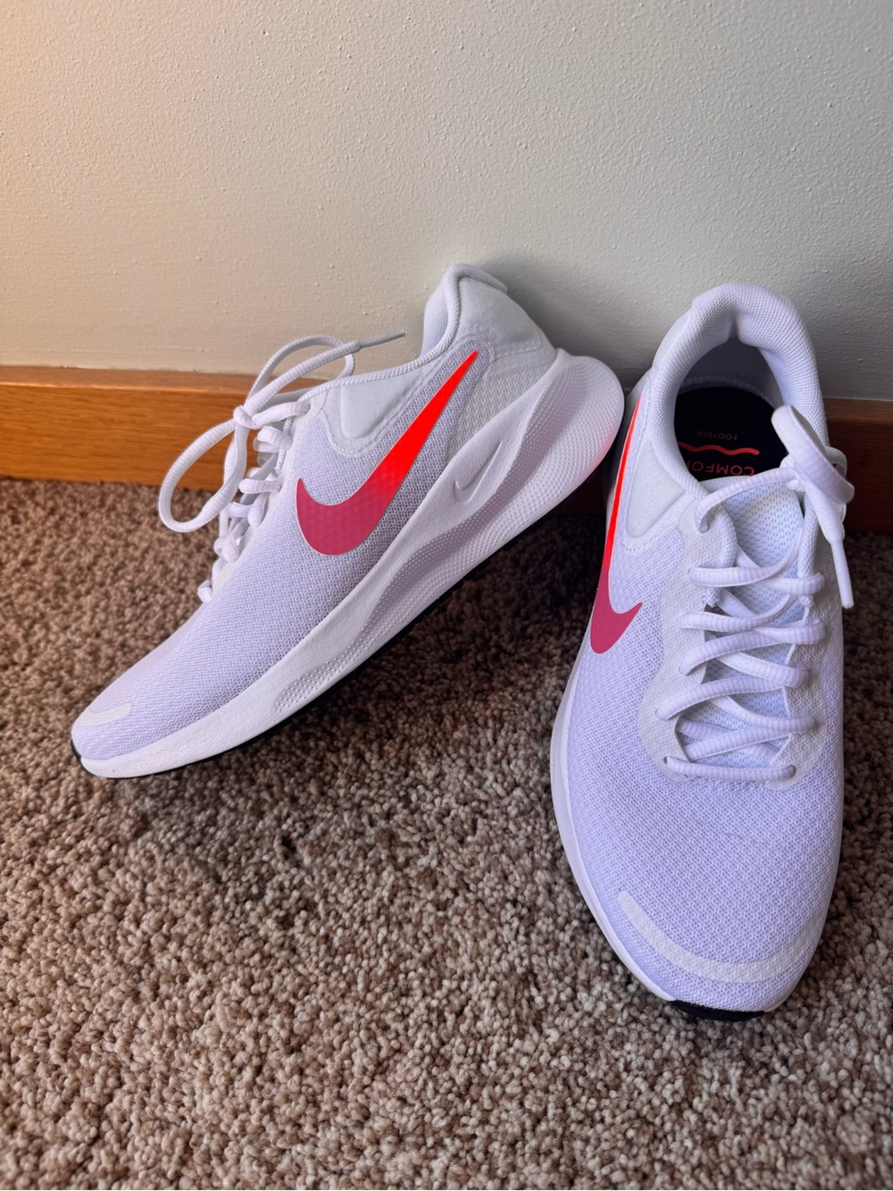 Nike White Women's Running Sneakers with Pink Swoosh